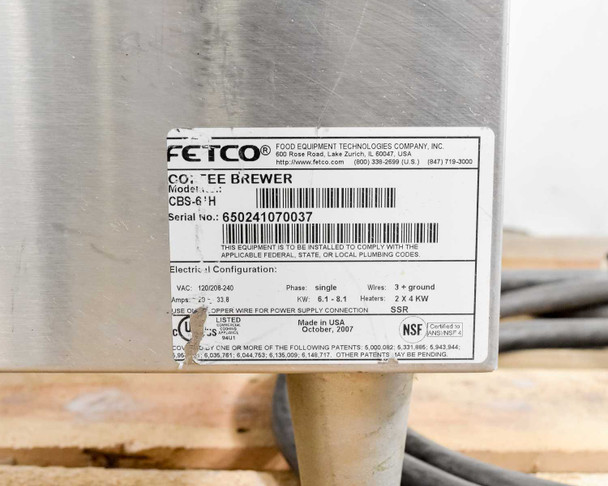 Fetco CBS-61H rating plate showing model CBS-61H, serial 650241070037, 120/208-240V single phase, 2x4 kW heaters, SSR, manufactured October 2007, UL and NSF listed