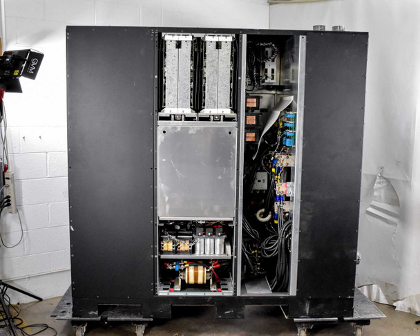 Eaton 9395-275 UPS interior view with cabinet doors open showing internal power modules and wiring harness