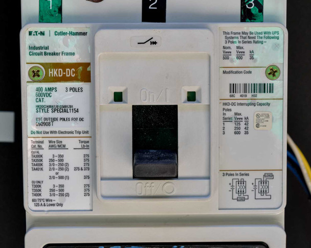 Close-up of Eaton Cutler-Hammer HKD-DC breaker face plate showing 400A, 3 Poles, 600VDC, Style Special 1154 rating label