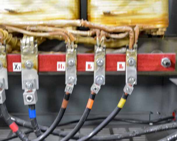 MGM Transformer AD370 – closeup of secondary terminal bus showing X1, X2, X3 lugs with color-coded lead wires