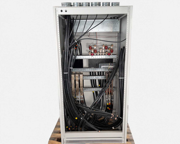 Interior rear view of transfer switch showing vertical bus bars, distribution wiring, and terminal blocks