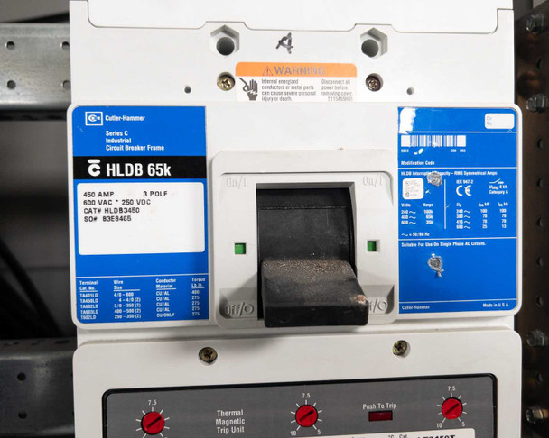 Cutler-Hammer HLDB 65k 450A 3-pole 600VAC 250VDC molded-case circuit breaker close-up with blue label