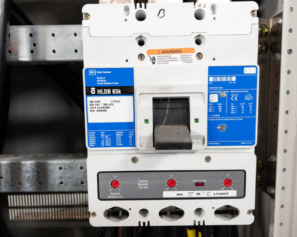 Cutler-Hammer HLDB 65k 450A 3-pole breaker close-up showing thermal magnetic trip unit set to 450A