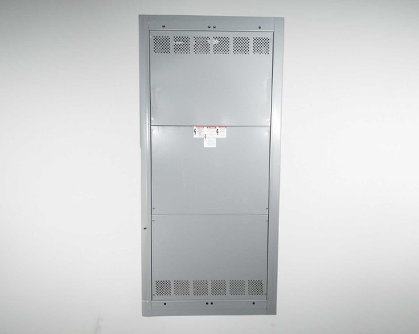 GE Spectra Series Switchboard – rear full-panel view showing upper and lower ventilation panels and central warning label area