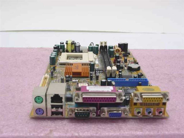 PC Chips 528mE11 GFXcel Socket 370 motherboard — angled front view showing I/O panel with PS/2, USB, LAN, parallel, serial, and VGA ports