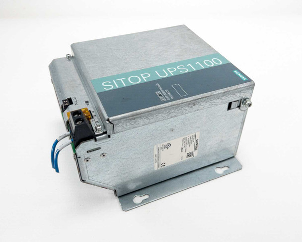Siemens SITOP UPS1100 battery module — rear three-quarter view showing enclosure, mounting bracket, and left-side connector area
