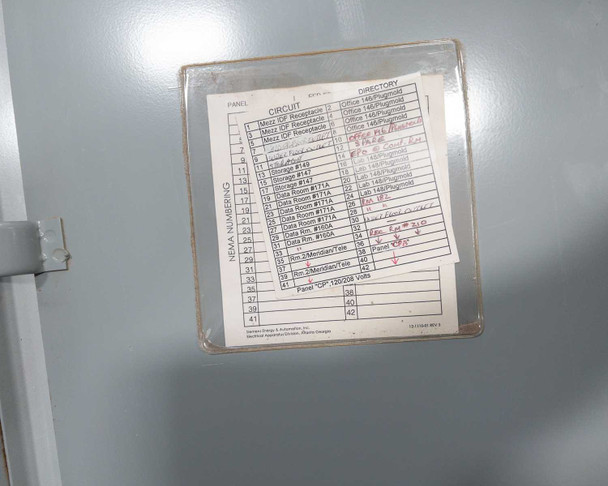 Panel circuit directory label inside door showing 42-circuit layout with handwritten circuit labels
