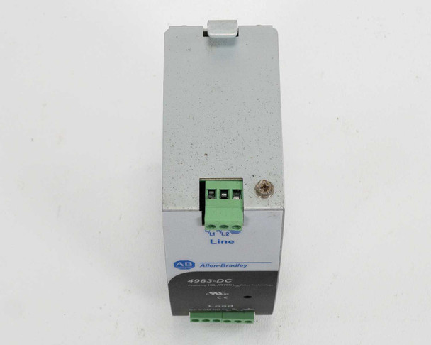 Allen Bradley 4983-DC120-05 surge protector — top-down angled view showing green Line screw terminal block and 4983-DC series label