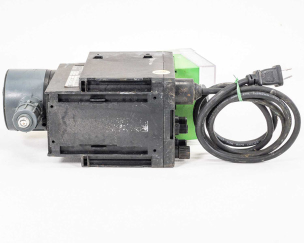 Grundfos Alldos DDA 12-10 dosing pump – bottom view showing base of motor housing, mounting slots, and liquid end inlet/outlet fittings