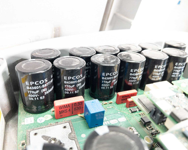 SMA Sunny Boy SB 3800-US-10 — close-up of EPCOS B43601-S977 770µF 400V electrolytic capacitor bank and WIMA MKS4 0.33µF 630V film capacitors on main PCB