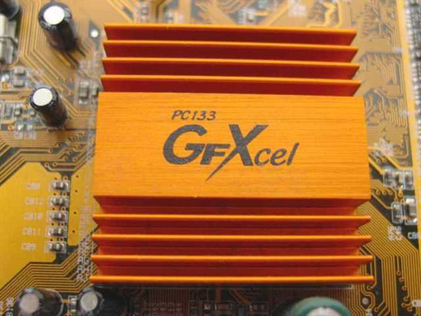 PC Chips 528VE10 motherboard GFXcel heatsink closeup — orange aluminum heatsink labeled PC133 GFXcel