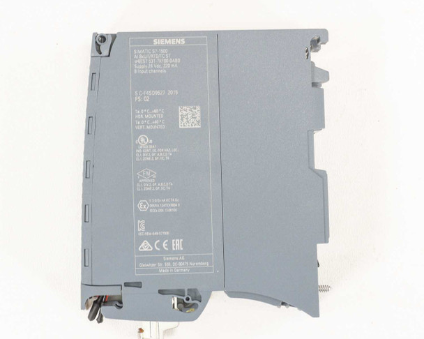 Siemens 6ES7531-7KF00-0AB0 S7-1500 Analog Input Module – rear panel closeup showing SIMATIC S7-1500 dataplate, manufacture date 2015, and FS:02 firmware revision