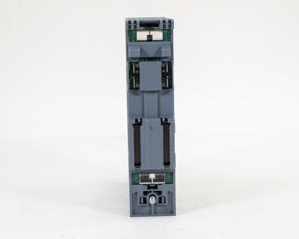 Siemens 6ES7522-1BH01-0AB0 S7-1500 Digital Output Module — bottom view showing backplane bus connector contacts and locking mechanism