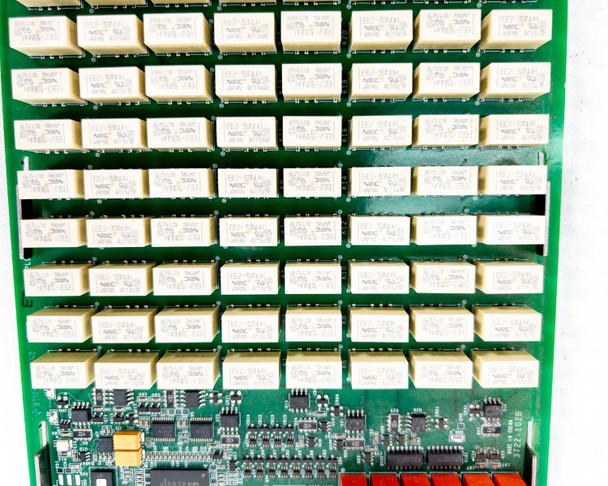 Keithley 3722 relay array close-up — rows of NEC latching electromechanical relays across the full PCB