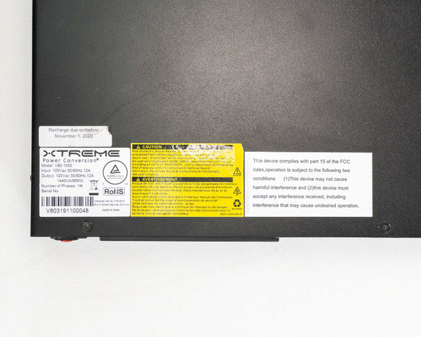 Xtreme Power Conversion V80-1500 UPS – bottom label showing model, serial, input/output specs and RoHS