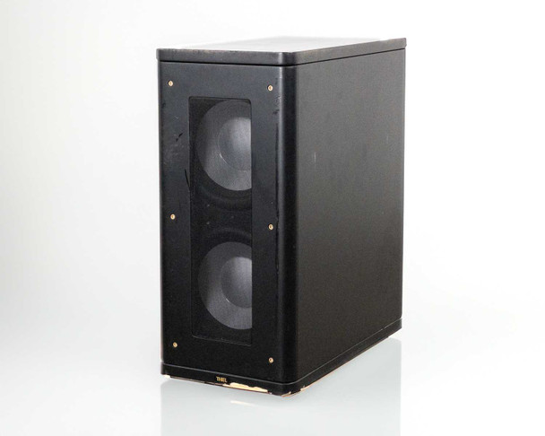 Thiel SS2 SmartSub powered subwoofer front-left angle showing dual 10-inch aluminum driver grilles and black cabinet