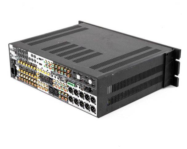 Anthem AVM 50V rear panel three-quarter view showing left and right sides of the connector panel with XLR balanced outputs and HDMI bank visible