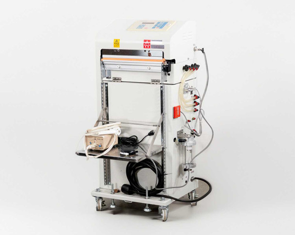 Fuji VG-400C-10W impulse sealer with gas flushing on wheeled cart, three-quarter front-left view showing sealing jaw, tubing, and Hugle ionizer on lower shelf