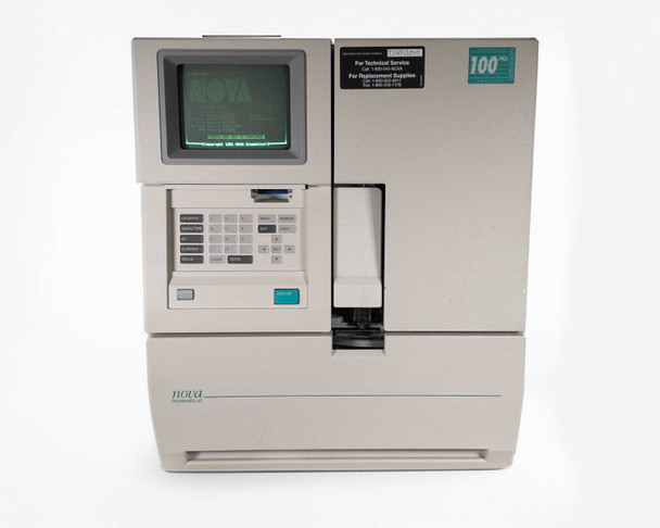 Nova Biomedical BioProfile 100 Plus REF 38296 – straight-on front view with CRT screen showing NOVA boot screen, keypad, and ANALYZE button