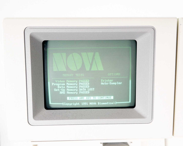 Nova Biomedical BioProfile 100 Plus CRT display – memory test screen showing Video, Program, Data (LOST), Set-Up, RMS memory results; Copyright 1991 Nova Biomedical