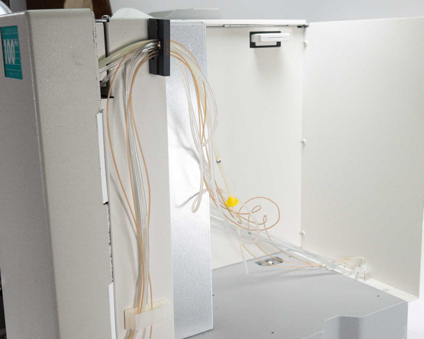 Nova Biomedical BioProfile 100 Plus – right side panel open showing internal wiring harness, fluidic tubing bundle, and reagent connectors
