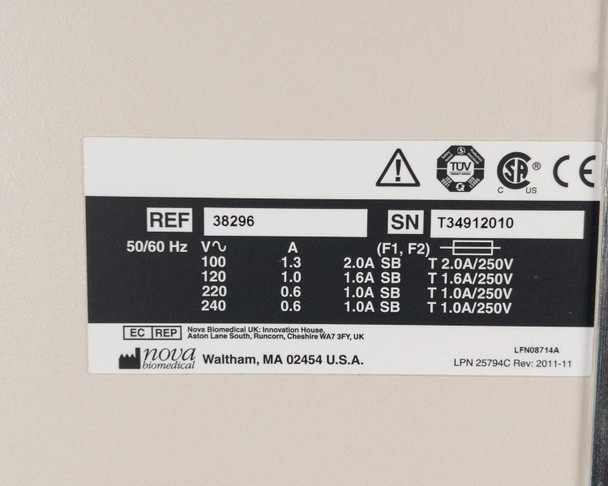 Nova Biomedical BioProfile 100 Plus rating plate – REF 38296, SN T34912010, voltage/current table 100-240V 50/60Hz, fuse ratings, Waltham MA label