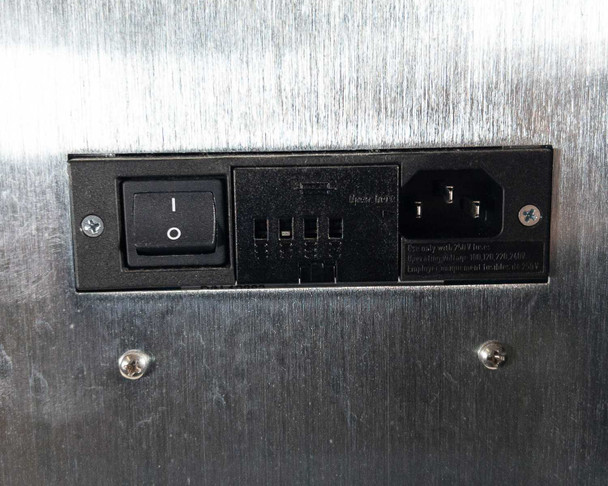 Nova Biomedical BioProfile 100 Plus – rear panel showing IEC AC power inlet, rocker power switch, fuse block, and voltage selector