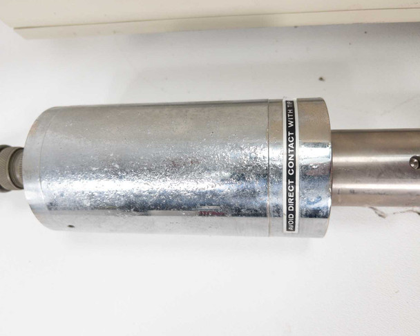 Branson Sonifier 450 converter body – cylindrical aluminum converter housing with caution label; titanium probe tip visible