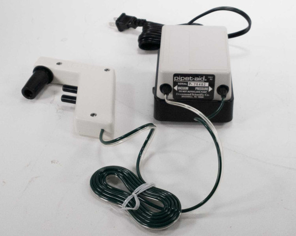 Drummond Pipet-Aid DP-111 dual pump filtration unit with filter adapter handpiece and green tubing coil – front-left view
