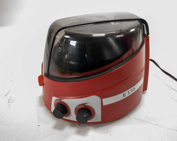 CAPP Rondo CR-68X microcentrifuge three-quarter rear view showing speed and time control dials and asset label
