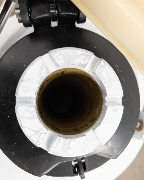 Open neck view of YDS-6 dewar showing inner tank bore and segmented white neck plug with numbered positions