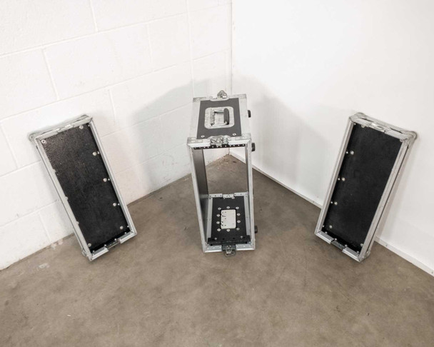 Tour Supply ATA flight case with both dual-opening lids removed and standing upright beside the open case body, showing 4U rack rails inside