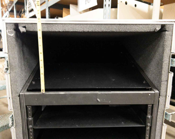 Interior close-up of Kent Custom Cases 8U rack case showing upper padded storage section and lower 8U rack rails with drawer