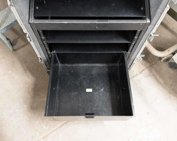 Pull-out drawer of Kent Custom Cases 8U road case fully extended, showing deep metal drawer tray with finger pull handle