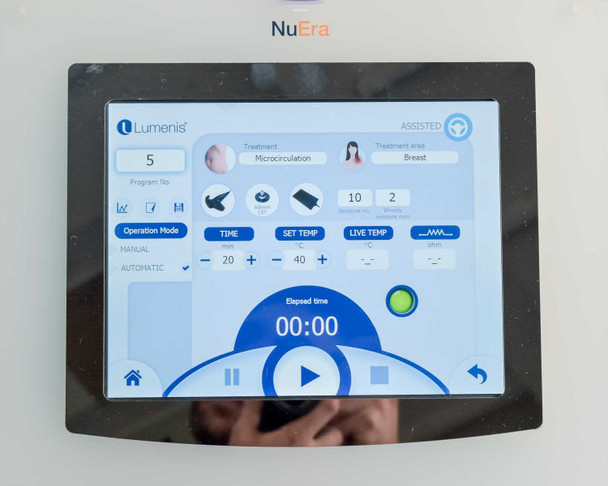Lumenis NuEra Tight touchscreen showing assisted mode with microcirculation treatment selected for breast area