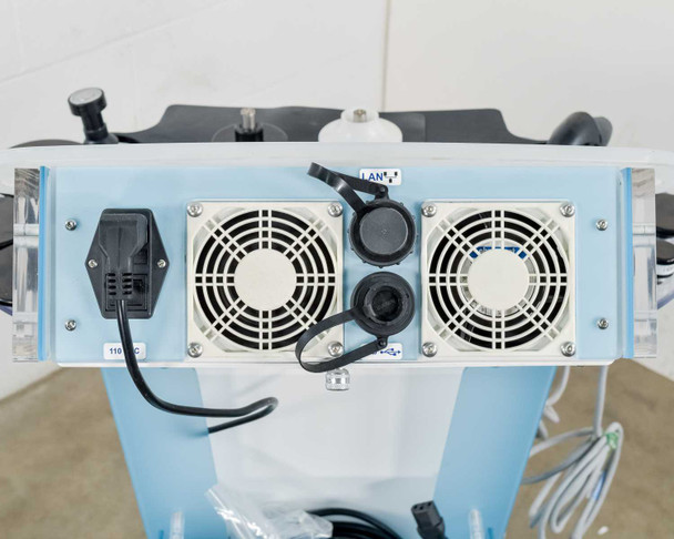 Lumenis NuEra Tight rear top panel showing dual cooling fans, power inlet, LAN port, and power cable