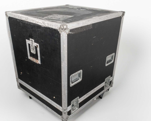 Ascot Superior ATA flight road case rear three-quarter view showing heavy-duty draw latches, side handles, caster wheels, scuffing and road wear on exterior panels