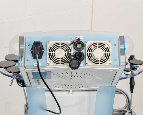 Lumenis NuEra Tight rear panel showing dual cooling fans, power inlet, and LAN port