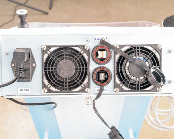 Lumenis NuEra Tight rear panel – 110 VAC power inlet, two cooling fans, LAN port, and USB port visible