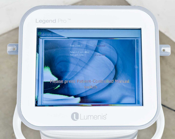 Lumenis Legend Pro touchscreen showing treatment mode selection screen with patient-controlled manual switch prompt