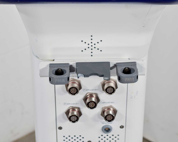 Pollogen Legend+ upper rear port panel showing four applicator connectors labeled Applicator 1 through 4 and two PMN port holders