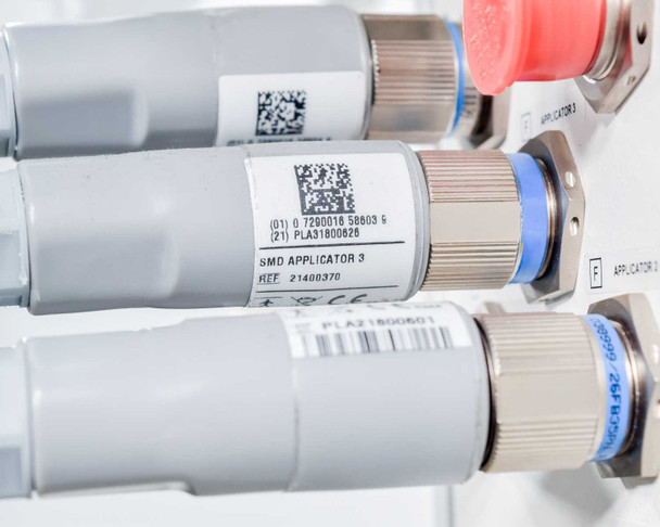 Close-up of Pollogen Legend+ SMD Applicator 3 label showing REF 21400370 and barcode on connector body