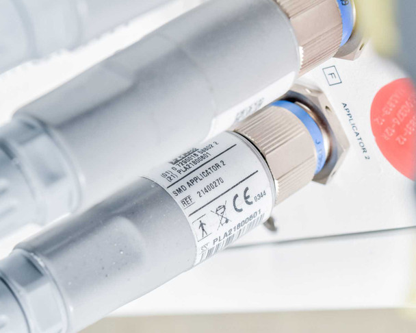 Close-up of Pollogen Legend+ SMD Applicator 2 label showing REF 21400270 and CE mark — connector detail