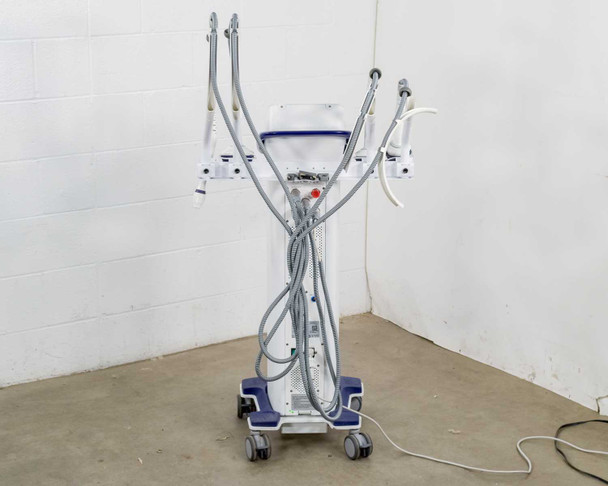 Pollogen Legend+ full rear view showing applicator arm structure, cable routing, and base with locking casters