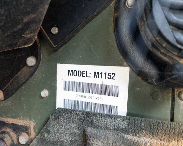 AM General M1152 model label with barcode showing NSN 2320-01-518-7332