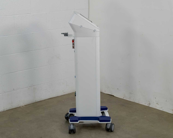 Pollogen Legend+ left side view showing mobile cart base with blue caster wheels and applicator arm mount