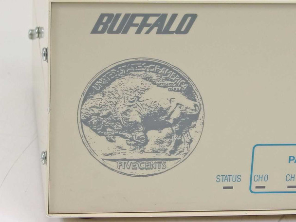 Buffalo Printer Buffer SL – close-up of front panel Buffalo logo and nickel coin emblem with STATUS and channel indicator strip