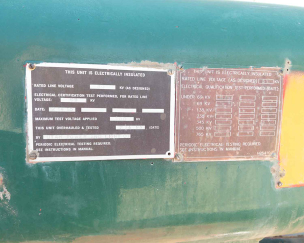 Electrical insulation certification plates on Hi-Ranger boom body – rated line voltage and qualification test fields