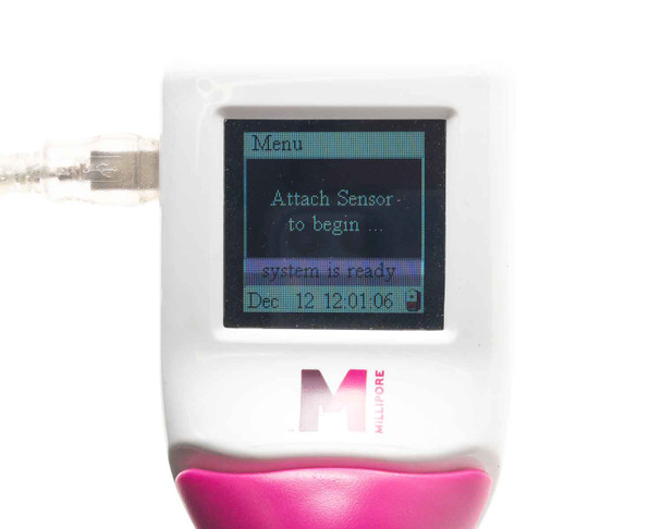 Millipore Scepter PHCC00000 – LCD screen displaying 'Attach Sensor to begin... system is ready' menu with date Dec 12 12:01:06, Millipore logo visible on body