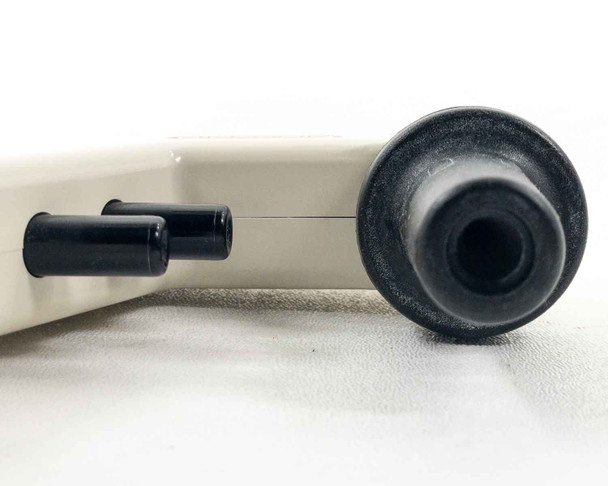 Close-up of Drummond Pipet-Aid nosepiece end showing rubber tissue culture nosepiece and two small black vent/filter port caps